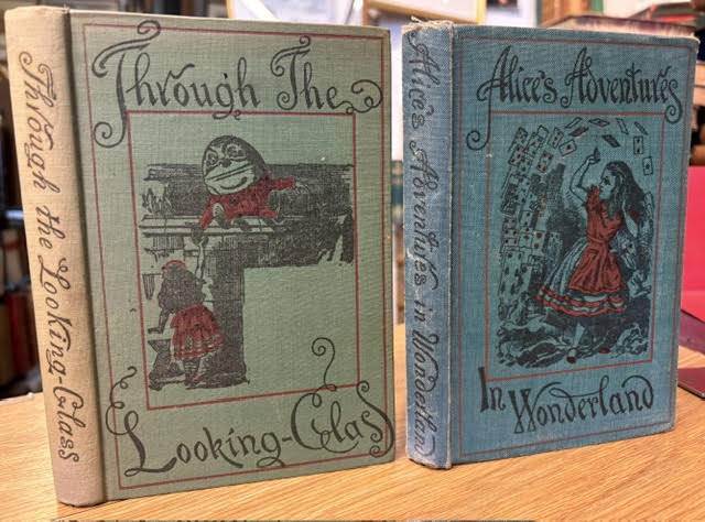 Alice's Adventures in Wonderland and Through the Looking-Glass and What Alice Found There. 2 volumes both with original gift drawings on their free endpapers.